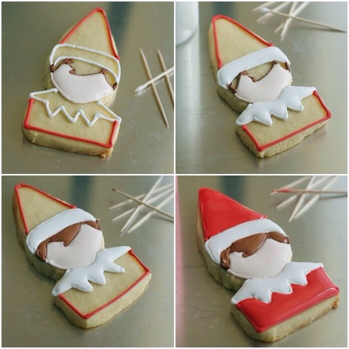 Fill in the sections of the elves with the thinned icings.  Use a toothpick to spread to edges and pop large air bubbles. 

Let sit at least one hour.