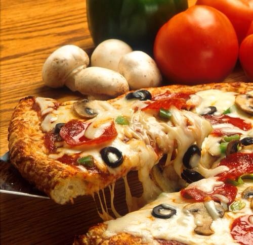 5. Delivery Pizza
Pizza is a weekend favorite for many families. Not only is this tradition expensive, it could be expanding your waist lines. Adding on extra cheese and fatty meats like pepperoni is a delicious, but unhealthy choice. One slice of pizza could be an entire meal worth of calories. 