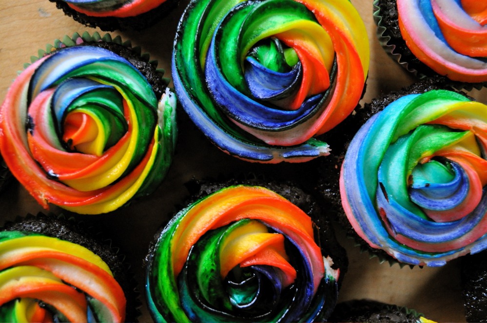 Step 2)
Evenly divide the mixture into 6 bowls.
•
•
Step 3)
Make  the different colored batter. Be sure to add at least 2-3 food coloring drops into each one; more for a lighter color, less for a darker color.
