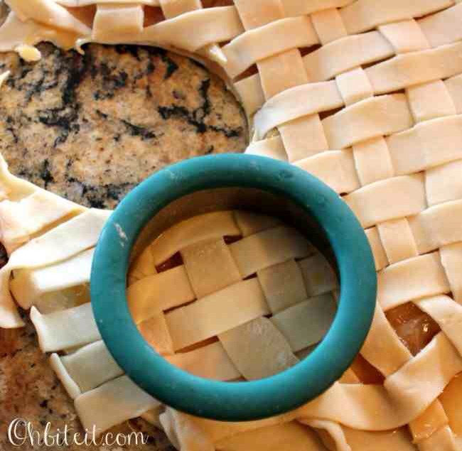 Create a lattice crust (just like on a pie) for the top of the pie filling…DON’T do what I did and create the lattice on the counter, it’s not fun getting it on top of the bottom crust..ugh!  ;)  Create your lattice on top of the actual filling, as if it were a pie!
