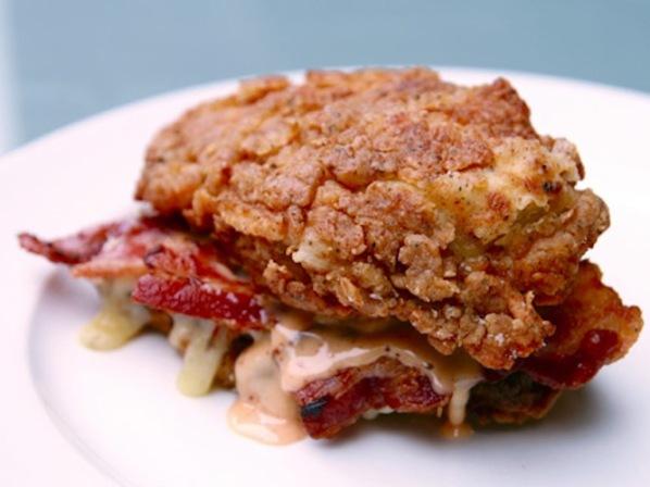 #3 KFC Double Down Sandwich

Use fried chicken instead of buns, filled with bacon, cheese, and even more "special sauce". What's in that special sauce? A mix of mayo, ketchup, fresh garlic, paprika, and a dash of Frank's Red Hot sauce.