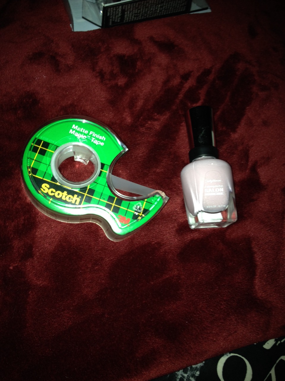 Step 8
Now get out your tape and your pink polish again