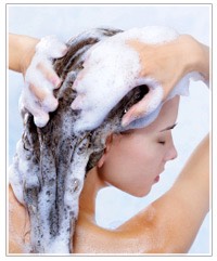 Wash it out but only using shampoo. If you use conditioner it will bring the oil back in your hair. 