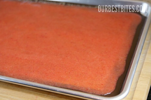 Spread Puree:  Use an offset spatula to gently spread the mixture in an even layer.  The more evenly you spread, the more evenly it cooks.  Keep the mixture away from the edges like in the photo above .  You’ll want it about 1/8″ thick. 