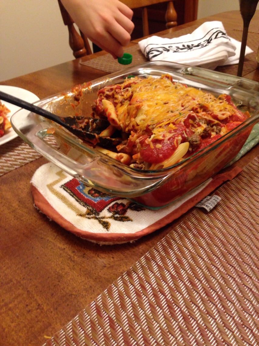 Repeat the process with the rest of your noodles, meat, and sauce. I'd suggest topping it off with a lot of cheese. Be sure to get the edges so it melts down into the sides. 
