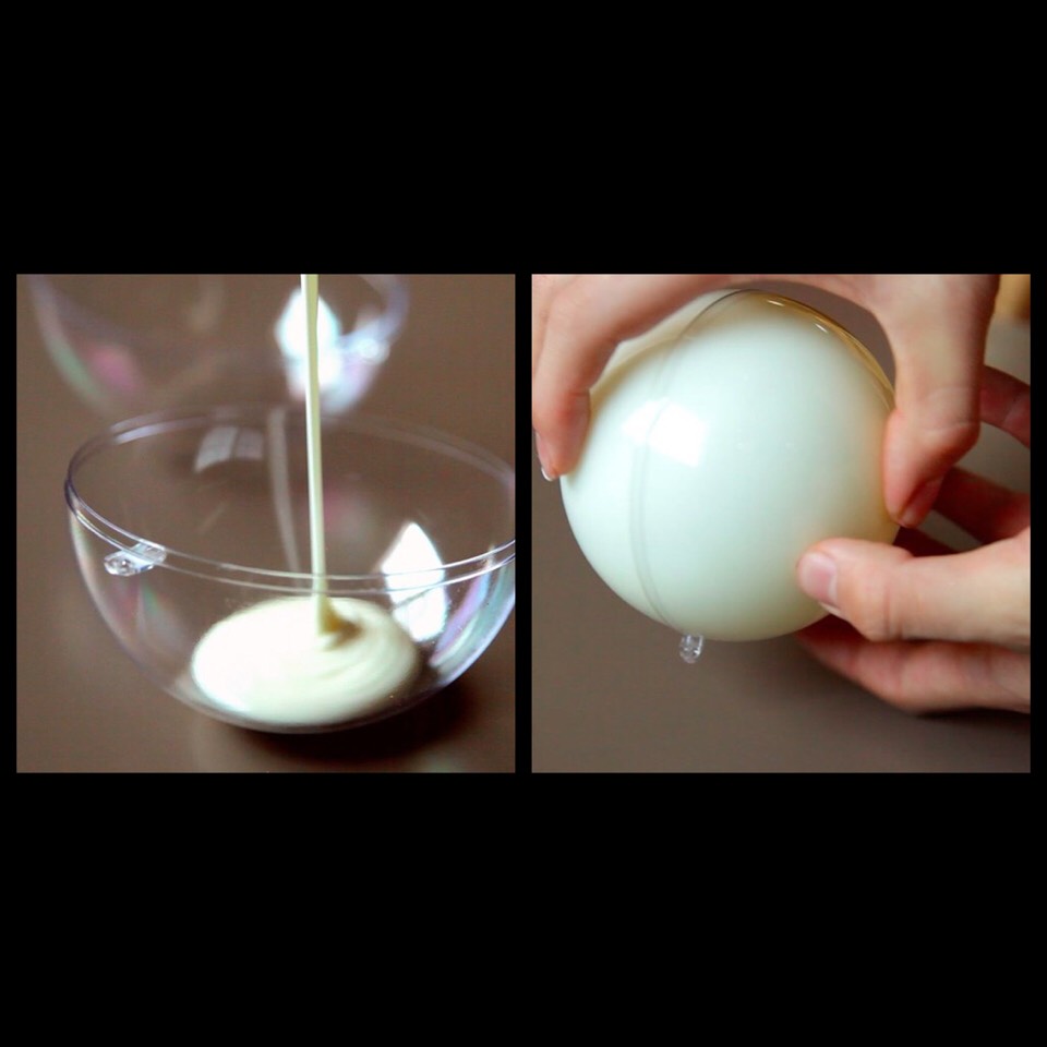 3. Twist it open, pour in the chocolate, then rotate so the chocolate covers all sides.