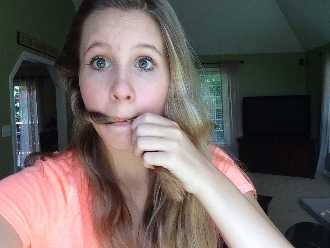 Now put the end in your mouth to hold it while you do the other side. I know this sounds weird, but it works.
