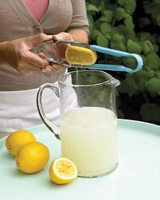 Martha Stewart suggests using tongs to squeeze the juice out of citrus fruits.