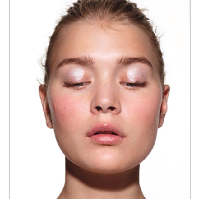 Step four: Apply shimmery base to the eye. This is simple, just sweep the lightest color in your eyeshadow palette across the lid of your eye. 