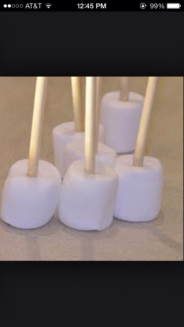 Put your sticks on your marshmallows.