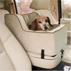 7. Build a custom made car seat in the compartment for your little furry friend