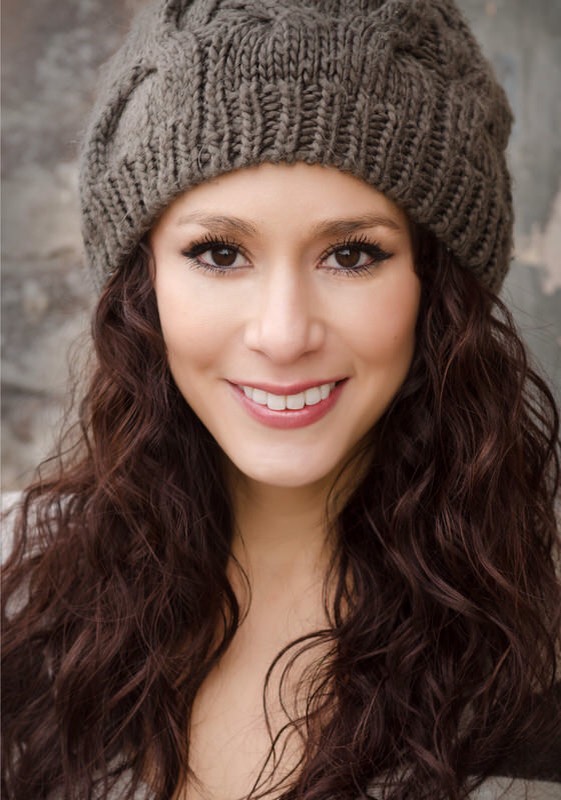 Freedom

This head of naturally gorgeous wavy hair is kept warm and accessorized with a beanie for a boho chin-inspired winter