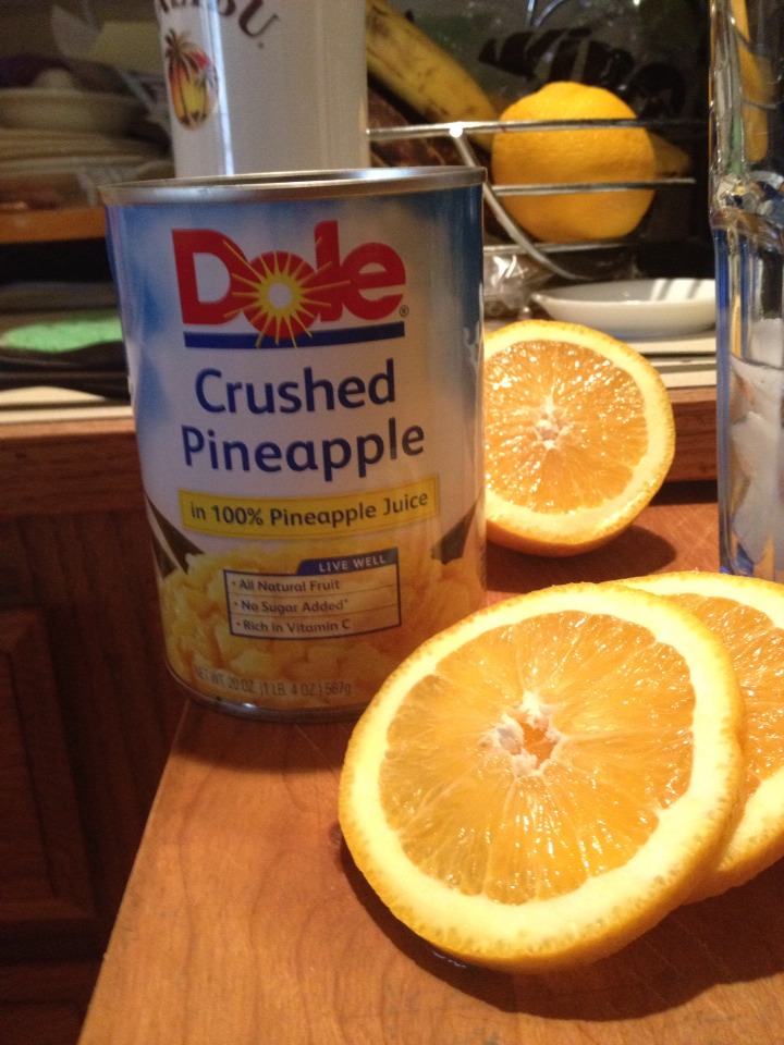 I prefer the chunks of pineapple in my drink, but you can use just pineapple juice. Fill the glass just over the halfway mark.
