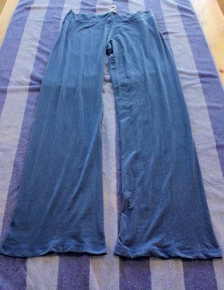 Continue to do this until the clothing item returns to its original size. Allow the item to air dry on the towel.

Found on: http://www.onegoodthingbyjillee.com/2012/10/how-to-resize-shrunken-clothes.html