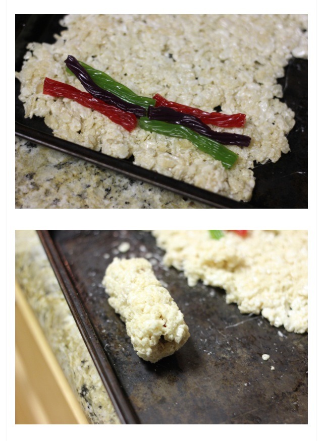3. For roll: place twizzlers or other flexible candy at the edge of the rice cereal mixture.  Wrap and roll, to a sushi roll shape.

