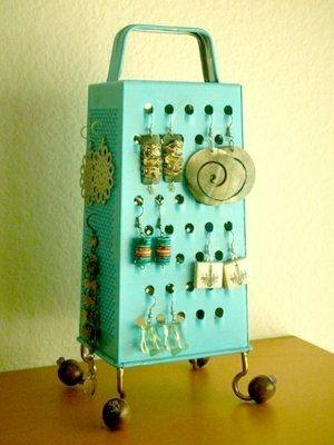 An affordable, easy way to keep your earrings from tangling: spray paint a cheese grater and hot glue large beads to the bottom for feet.