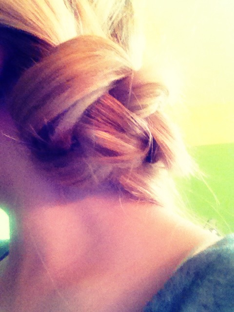The result is this beautiful knot! You will have some hair left over because you held down the middle section. Clip that to the back of your head and it secures in the bun 😉🌸