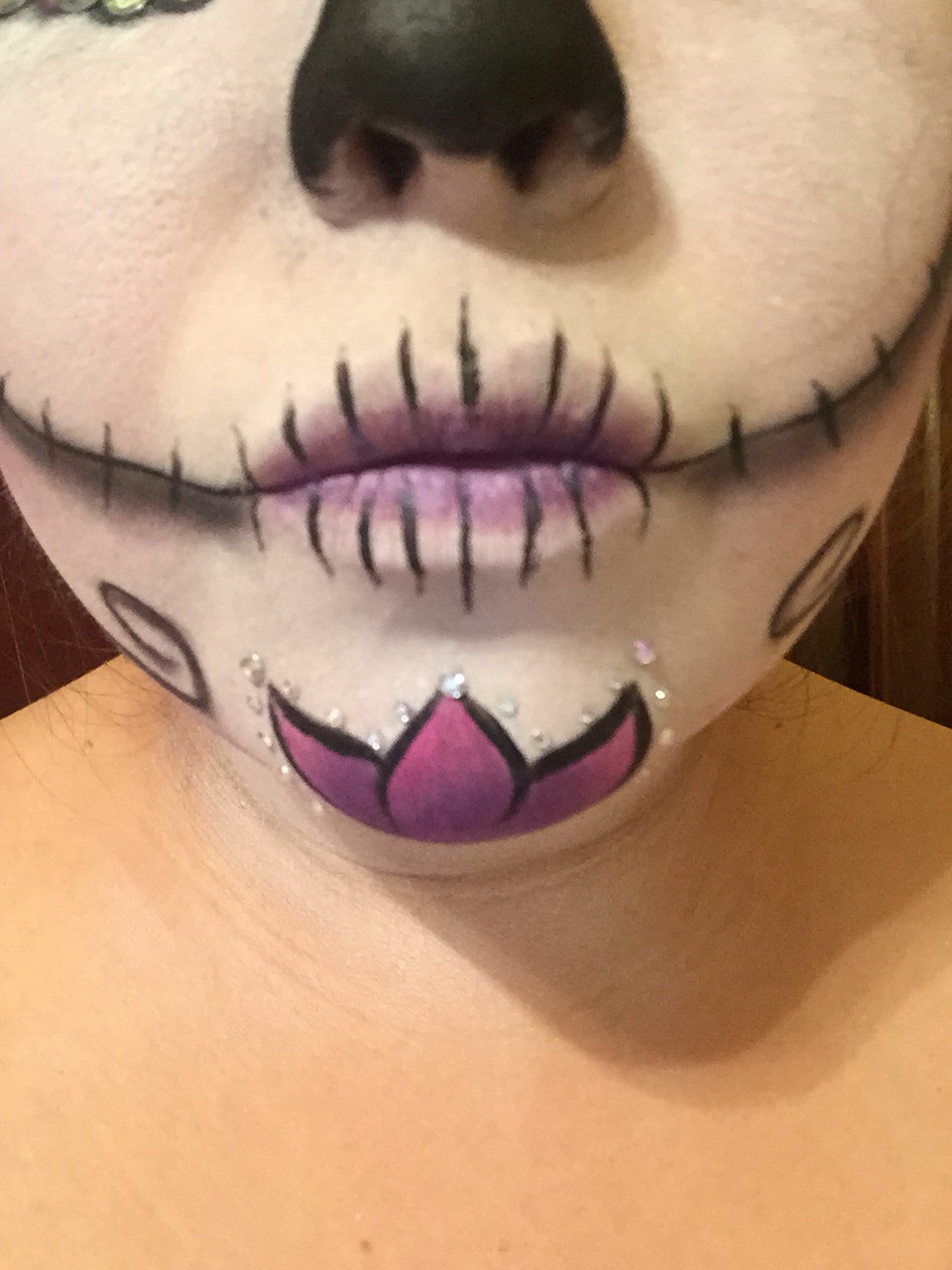 13) start your design on your chin to finish
***at this point you are basically done. If you feel you need more continue to add elements wherever you feel it needed!!