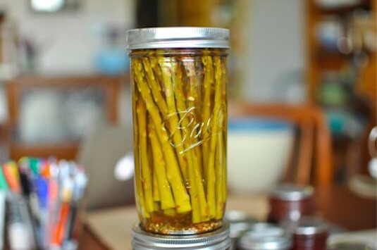 Spicy Pickled Asparagus 
Asparagus season is relatively short, but thanks to this spicy and amazing recipe from at home-preserving goddess Marisa McLellan, you can enjoy the snap of tasty asparagus well into next winter.

Get the recipe from Simple Bites.