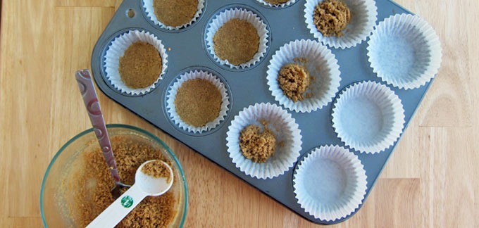 Fill each cupcake liner with 1 tablespoon of the crumbs. Use your fingers to compact the crumbs into a nice even layered crust.