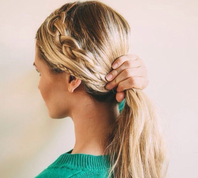 Gather all the hair at the back into a low ponytail but don't secure it yet.