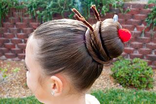 Start by pulling all of the hair tightly back into a ponytail.  (Wet hair works best.)