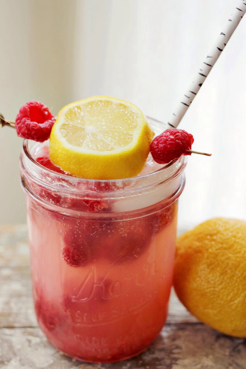 3. Push the raspberries purée through a fine mesh sieve to separate the seeds from the pulp.

4. Once the simple syrup has cooled, combine the raspberry purée, simple syrup and lemon juice in a large pitcher.

5. Add 4-6 cups of cold water. Add as little or as much as you want! Enjoy!