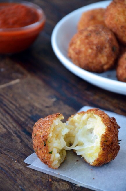 Arancini (Rice Balls) with Marinara Sauce
Having leftover rice in the fridge seems like the perfect excuse to whip up these crunchy and cheesy arancini or rice balls with marinara Sauce.
