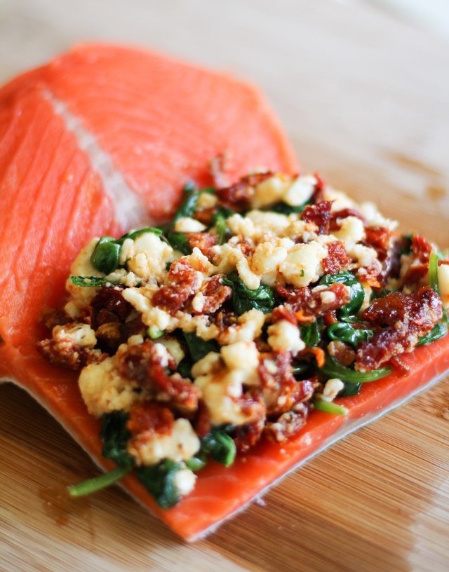 Step 9. Carefully transfer the salmon fillets to the prepared baking dish. Sprinkle with salt and pepper.