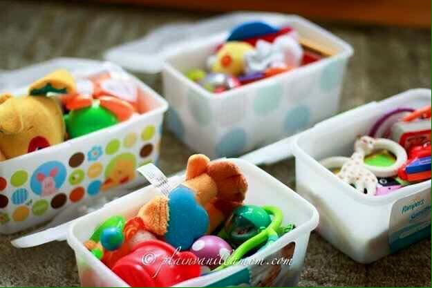 Use empty baby wipes box to use small toys so you can travel with