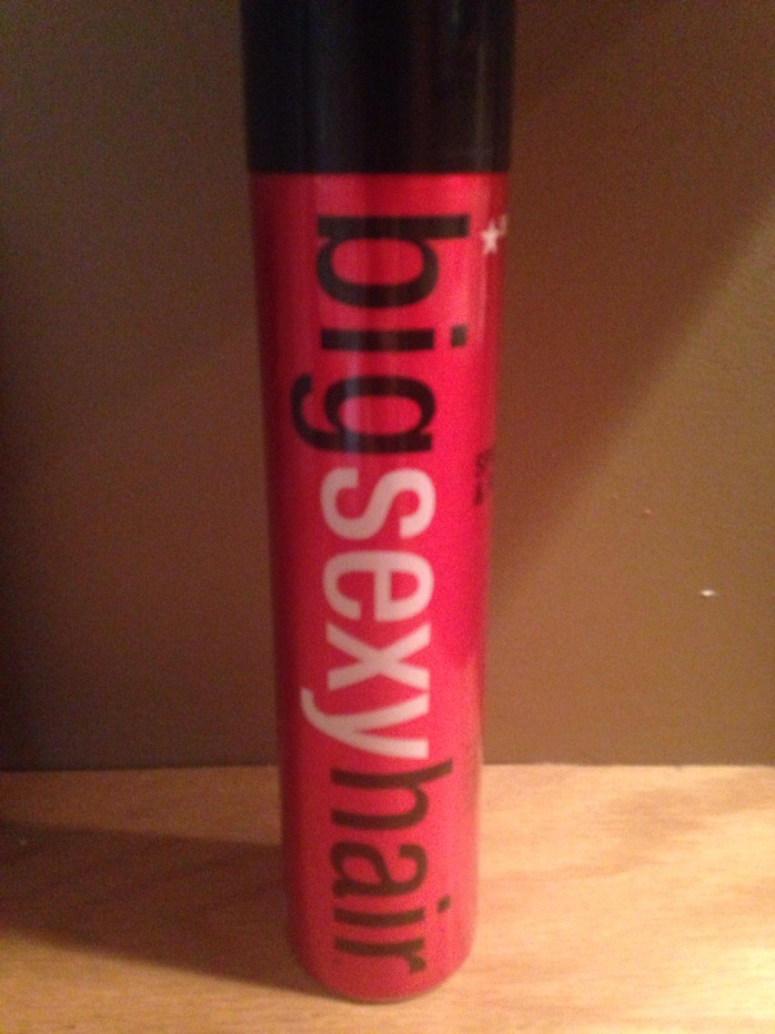 After both sides have dried, spray a very small amount of hairspray on each bobby pin. 