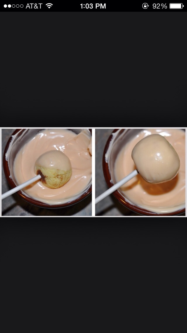 Dip the marshmallow, (Sorry I only found a tutorial of this step with only cake pops) in the melted chocolate.
