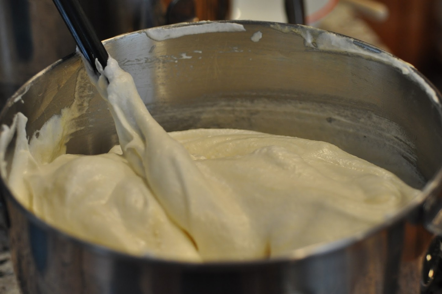 quickly fold the almond mixture into the egg whites, about 30 strokes.