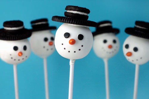 Now you can decorate the Oreo pop any way you would like. Dip it into chocolate, add sprinkles... Or even make a snowman!