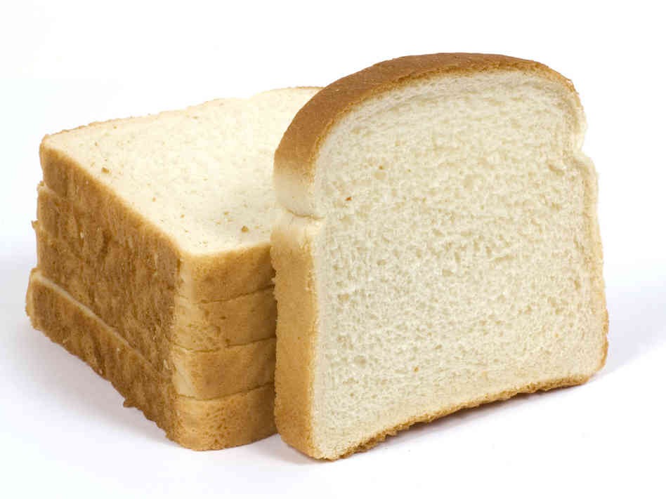 Add a slice of bread into a container of brown sugar and after a couple of days check the container the sugar absorbs moister from the bread keeping it soft  