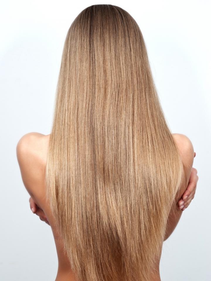 Use Dry shampoo
It absorbs excess oil on your strands and scalp and keeps your mane looking clean and fresh. If you don't have dry shampoo, try washing just the top of your head (or wherever there is oil), with regular shampoo followed by a quick blow dry. Your tresses will look as good as new.