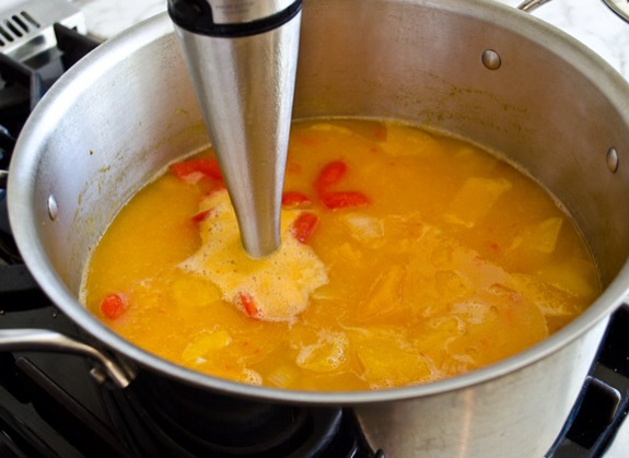 Purée the soup with a hand held immersion blender (or in a standard blender) until silky-smooth.