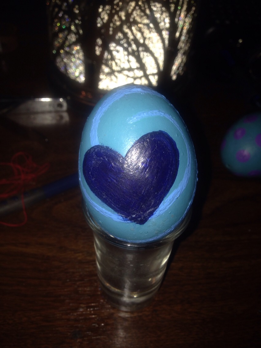 (This is the egg I made) 
3. Clean the egg and shake the egg full of water and blow again
4. Let your egg sit for a few days to dry out the eggs membrane if you wish to paint your egg now please do but make sure you let it sit. 
5. You can put a wire threw the egg and put it on a cup and paint it