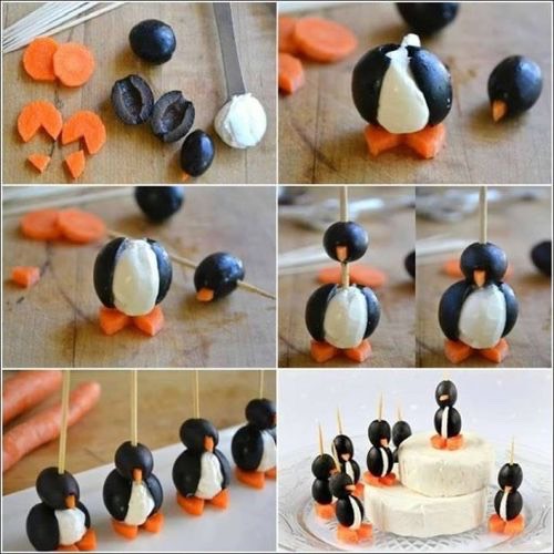 Cute little penguins made from olives carrots and Philadelphia!π±