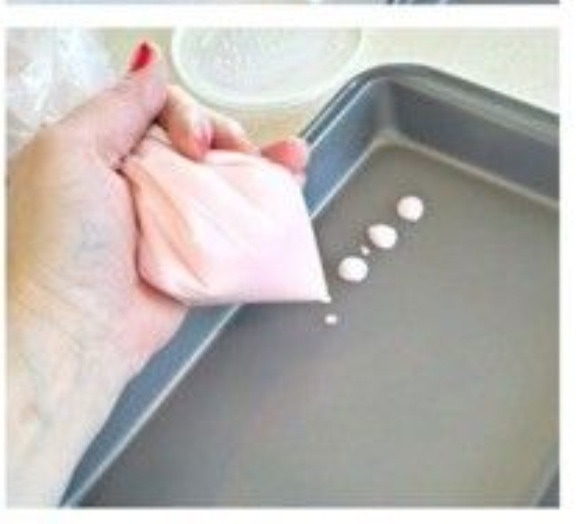 Cut the tip and squeeze yogurt onto a cookie sheet