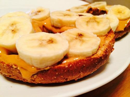 Another quick, easy meal is a delicious whole-grain bagel topped with peanut butter and fruit! For cheapness’ sake, I used the same kind of fruit for the bagel that I used for the cereal. 

There are countless options for healthy bagel toppings, but nothing beats the classic banana & PB.