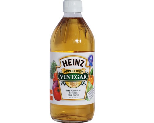 While your in the shower, give your hair an apple cider vinegar rinse (after shampoo and conditioner.) Thus resulting in no dandruff or product build-up. Do worry about the smell  it vanishes as soon as your hairs dries.  