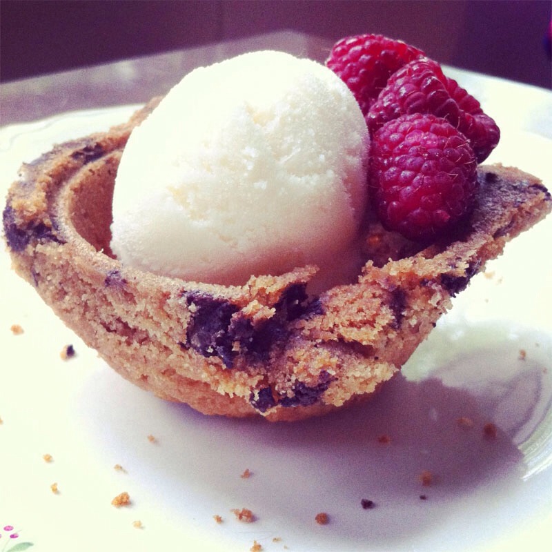 Make your own cookie bowls by taking a cupcake try turning it upside down and moulding cookie dough over the moulds to make a bowl shape. Do it on every other mould so the bowls don't stick together and break apart when you take it off. Grease the pan first ! 