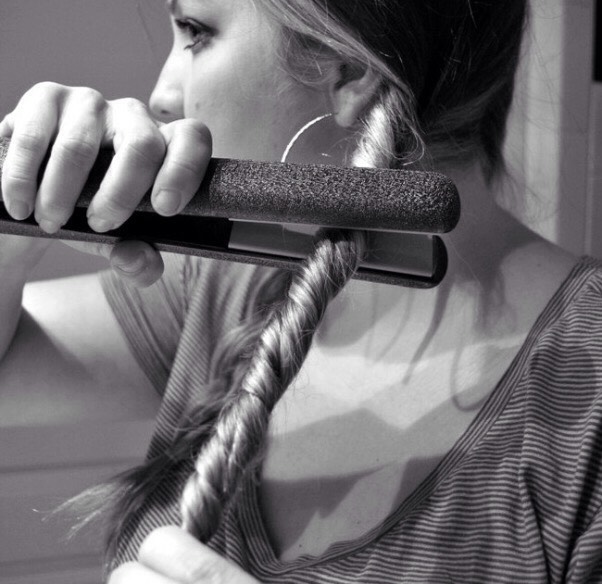 For a sexy tousled look, run straighteners over lightly braided hair.
