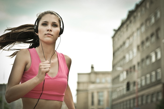 Running with music is a great was to get motivated to run but don't turn it up to loud so you can hear the cars.