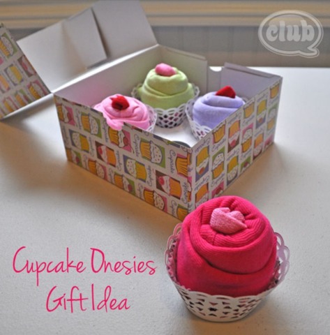 Cupcake onesies! Roll a onesie into a basket and stuff with a hat in another color.