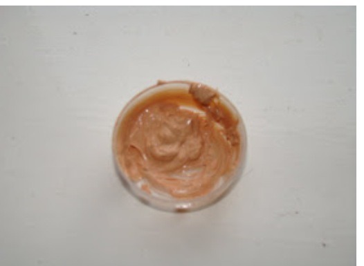 Take half a tea spoon of body butter in the container and add equal amount of liquid foundation in it i.e half a tea spoon. Mix well with the help of Q tip until they both are amalgamated. 