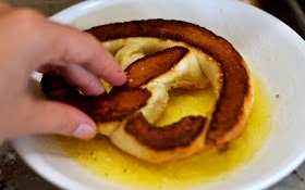 Bake for about 7-11 minutes or until browned. Then the big secret is dipping them in melted butter while hot. Now you know they must be as good as I'm making them out to be. Serve with cheese sauce. 