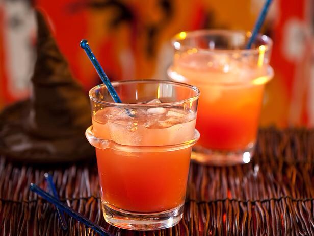 Witches Brew

Ingredients:
2 oz. mixed pineapple and cranberry juice 
2 oz. 7-Up or Sprite
1-1/4 oz. shot Malibu Coconut Rum

Preparation:
Mix juices and 7-Up or Sprite in a highball glass. Pour shot of rum down the side of the glass right before drinking.