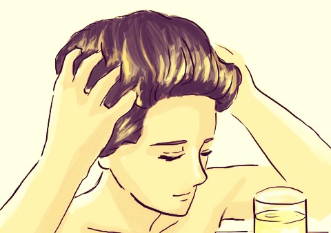 Massage the olive oil in your scalp for around a minute. Make sure it covers your whole scalp for best results.